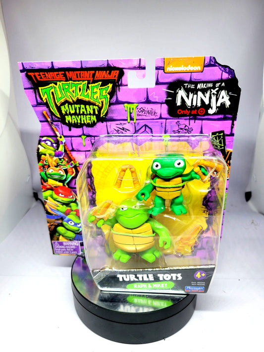 Playmates Teenage Mutant Ninja Turtles Mutant Mayhem The Making of a Ninja Turtle Tots Raph and Mikey Action Figure